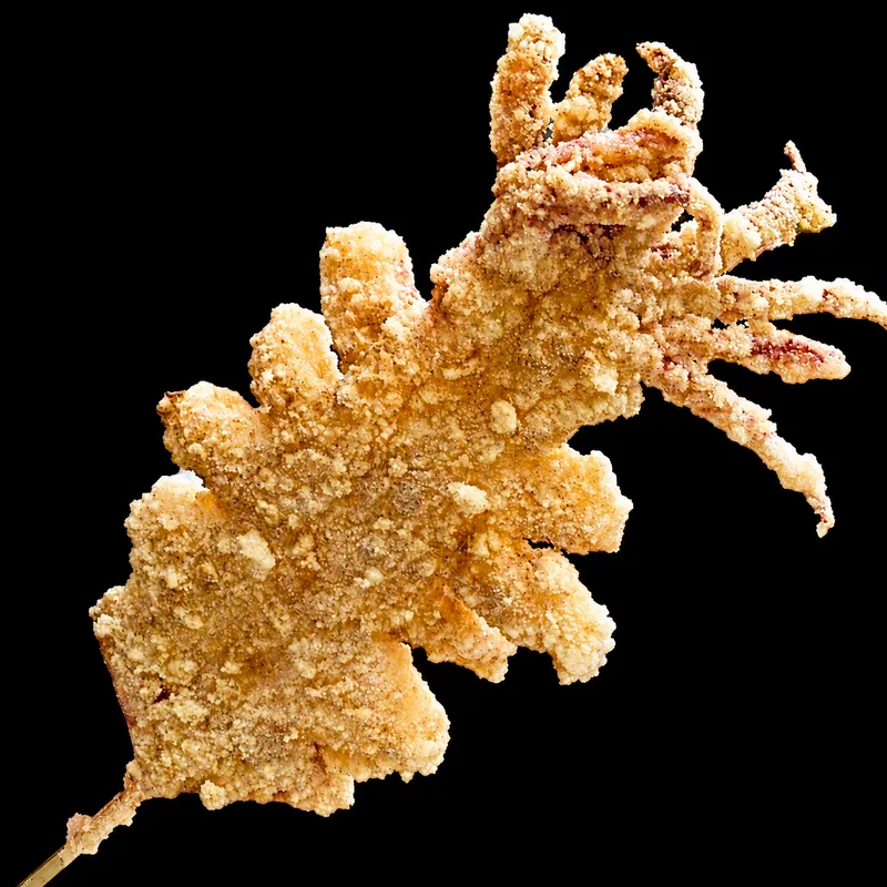 丸ごと一杯のイカを揚げた酥炸大?魚(スーザーダーヨウイ)