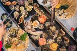 食べ放題で提供される牡蠣料理や海鮮メニューの数々