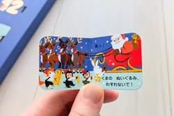 「毎日1冊ミニ絵本が小窓から！読んで飾ってパズルにもなる講談社アドベントカレンダー」の写真